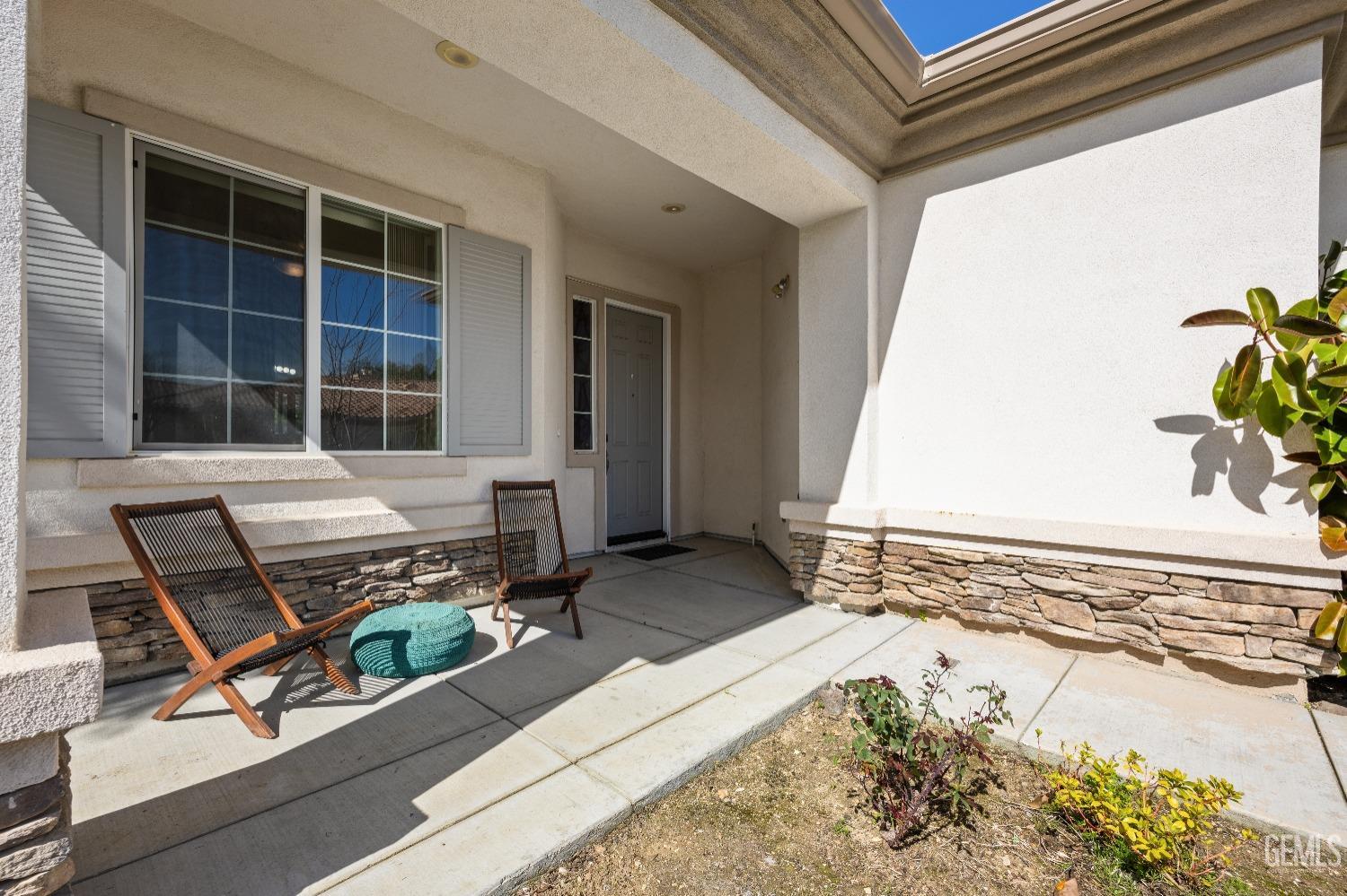 Undisclosed Address Bakersfield, CA 93306 - Photo 4 of 24 a front view of a house with sitting area