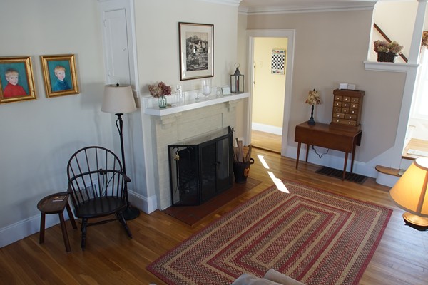 37 Kendall Road Lexington, MA 02421 - Photo 8 of 29 a living room with furniture and a fireplace