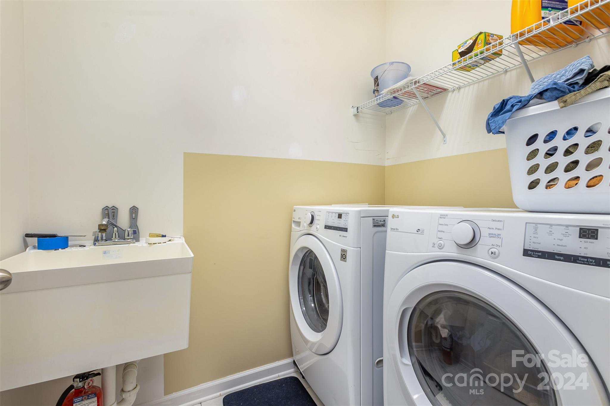 311 Wave Crest Drive Fort Mill, SC 29708 - Photo 11 of 45 a utility room with dryer and washer