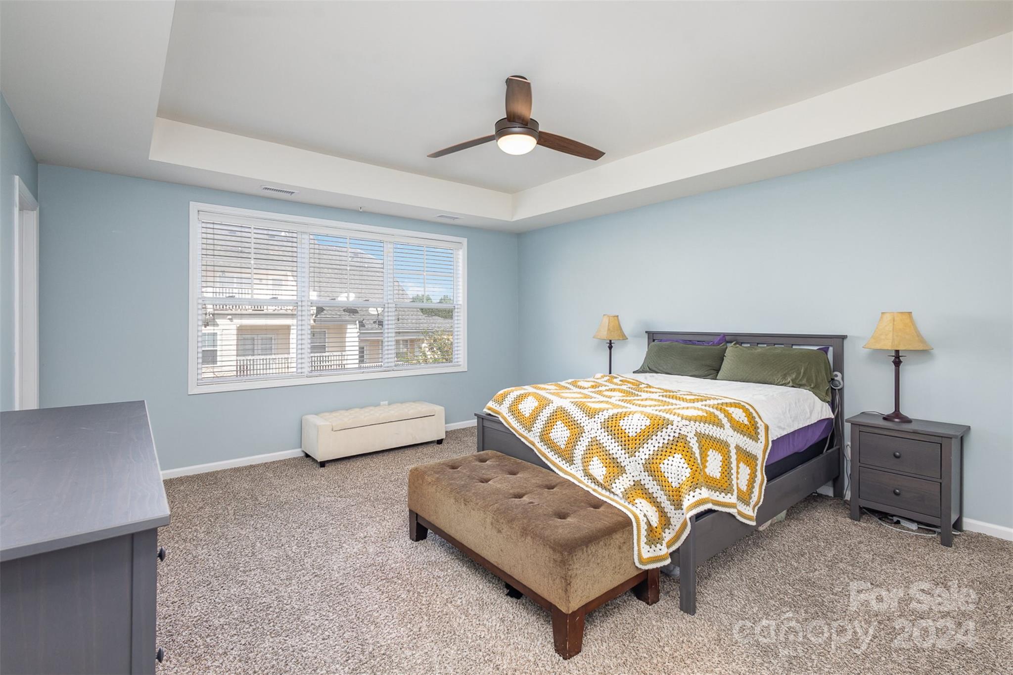 311 Wave Crest Drive Fort Mill, SC 29708 - Photo 13 of 45 a bedroom with a bed and window