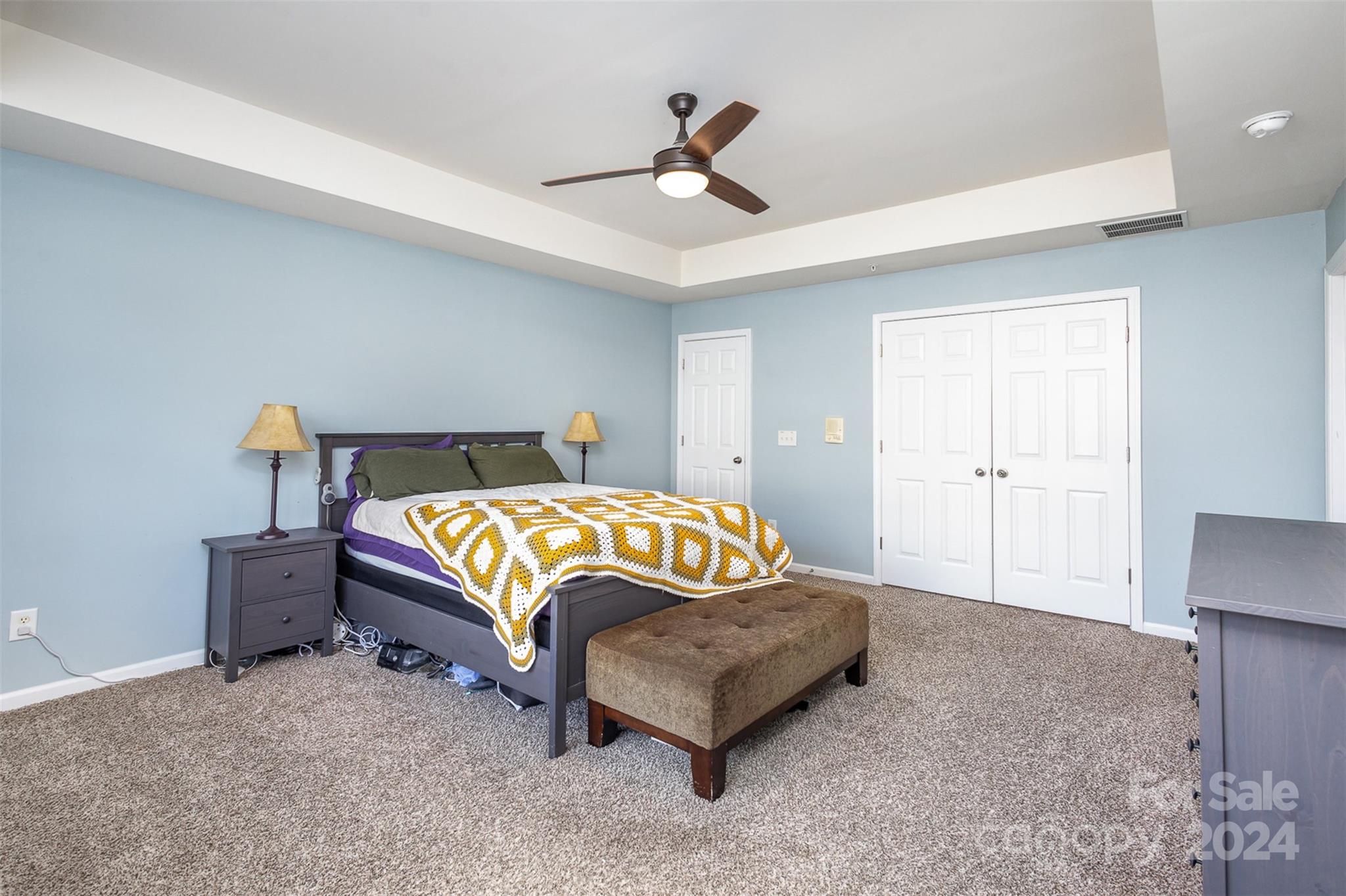 311 Wave Crest Drive Fort Mill, SC 29708 - Photo 14 of 45 a bedroom with a bed and window