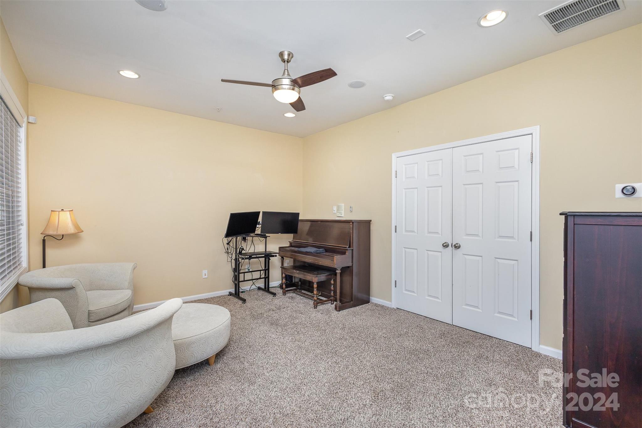 311 Wave Crest Drive Fort Mill, SC 29708 - Photo 20 of 45 a work room with furniture and a ceiling fan