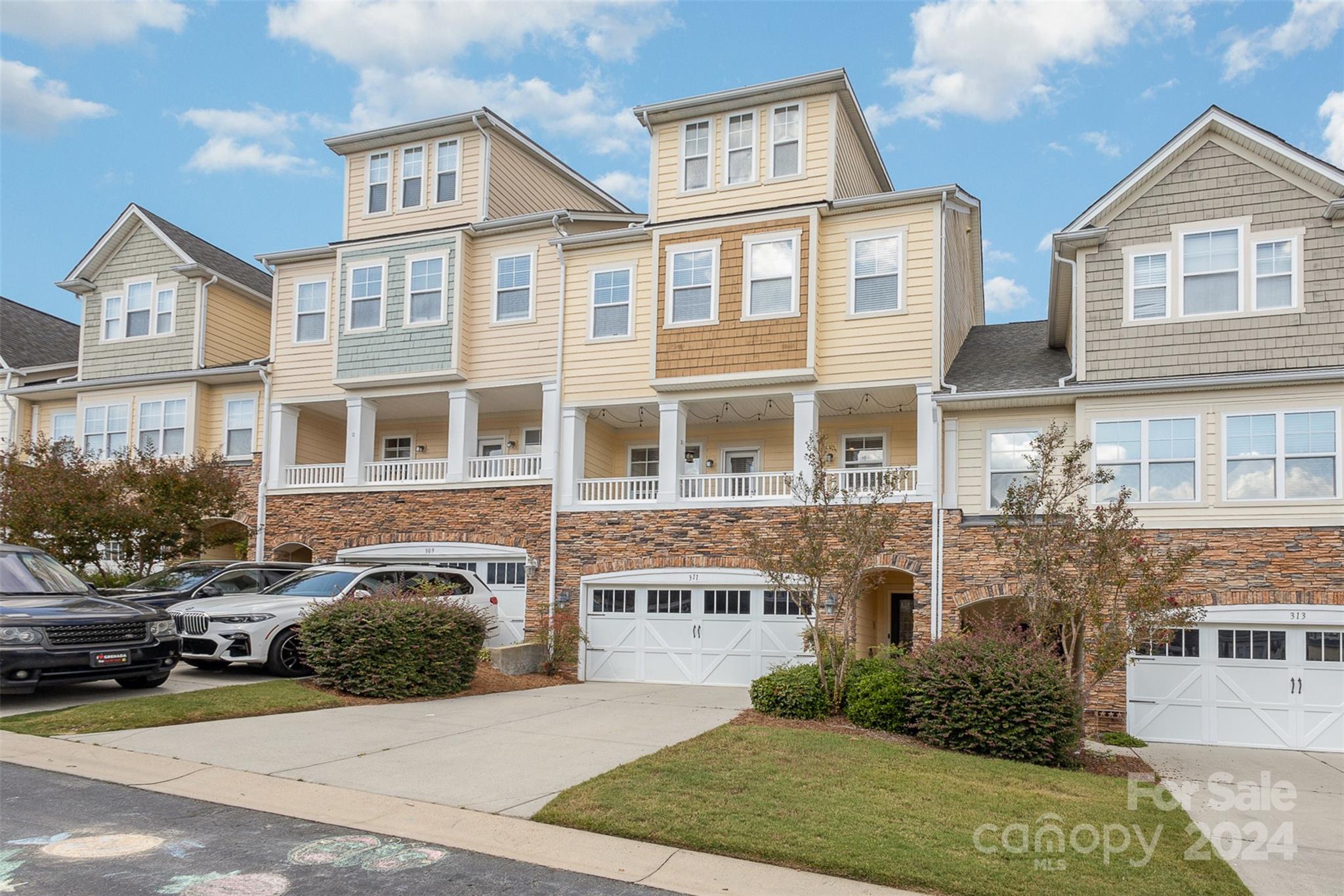 311 Wave Crest Drive Fort Mill, SC 29708 - Photo 2 of 45 a view of a building with many windows