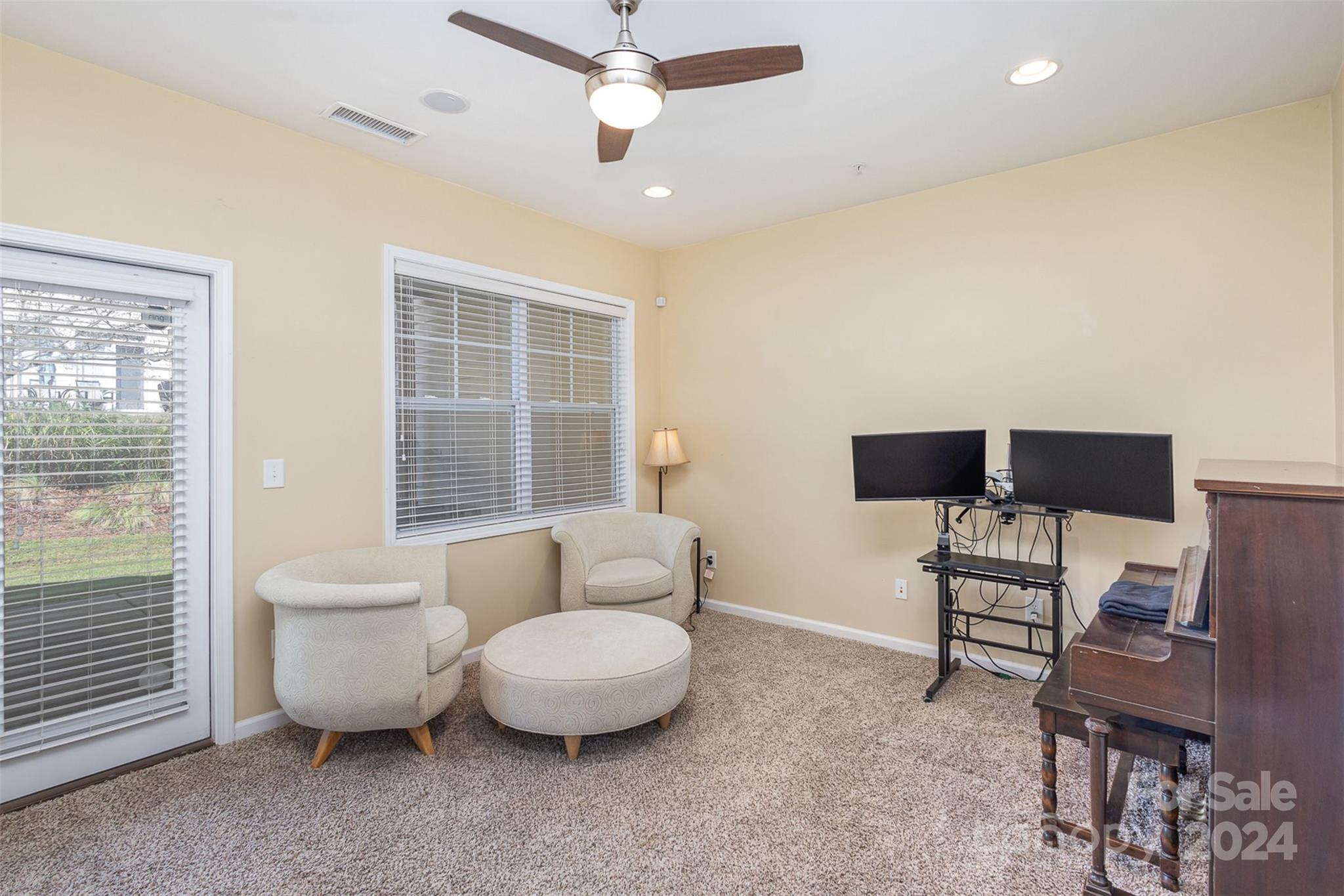 311 Wave Crest Drive Fort Mill, SC 29708 - Photo 21 of 45 a living room with furniture and a window