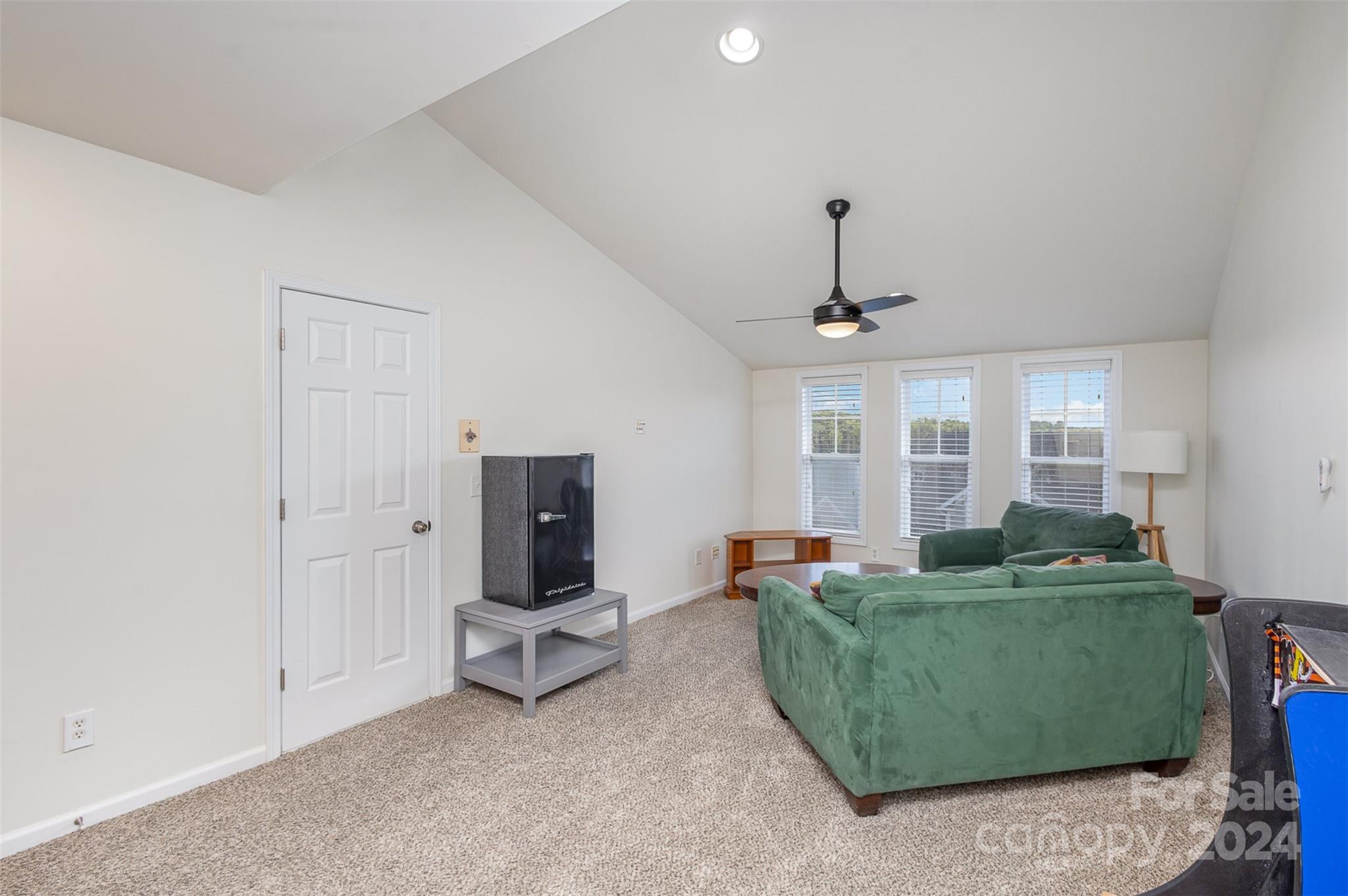 311 Wave Crest Drive Fort Mill, SC 29708 - Photo 26 of 45 a living room with furniture and a window