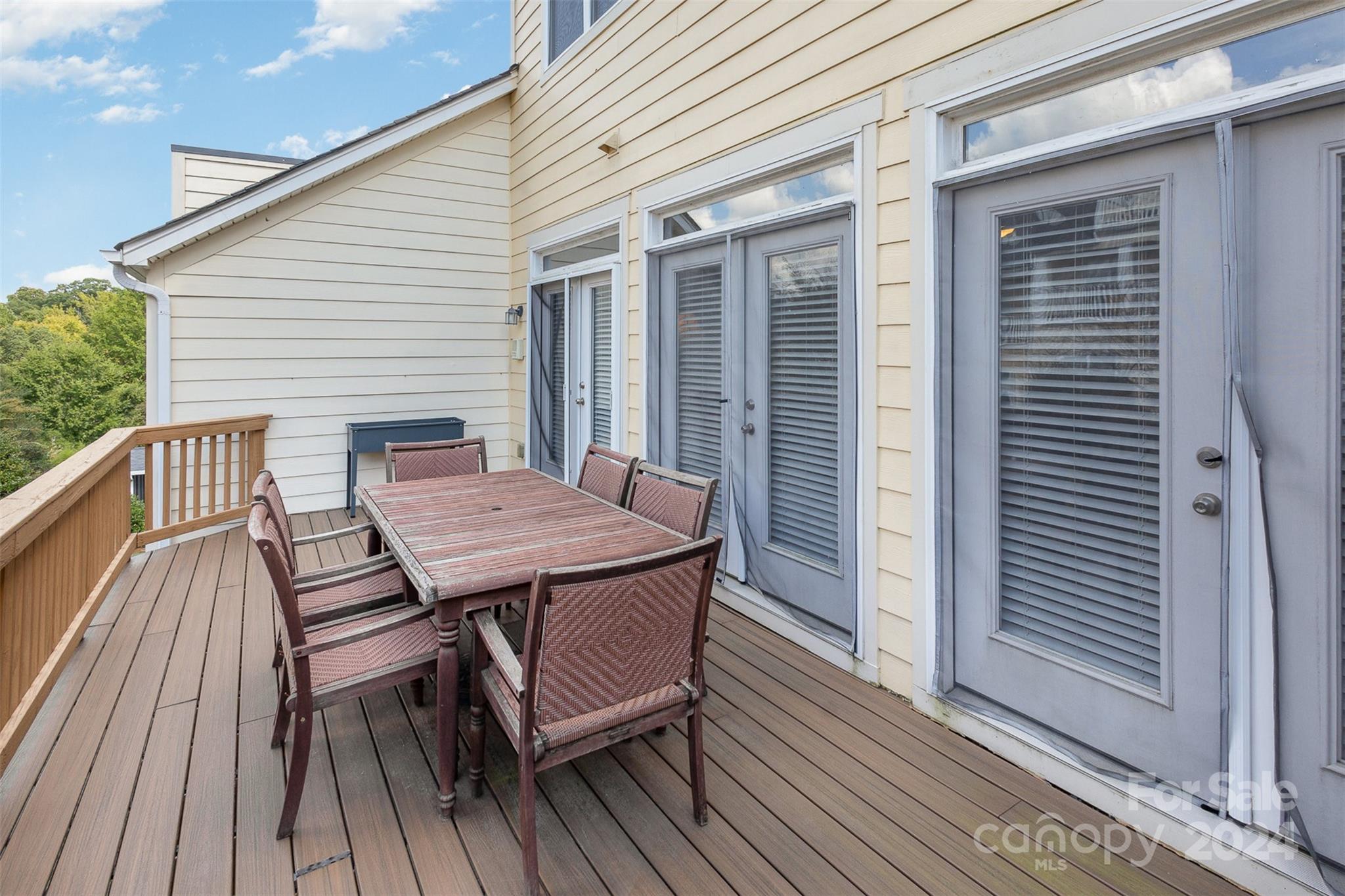 311 Wave Crest Drive Fort Mill, SC 29708 - Photo 31 of 45 a view of a wooden chairs on the deck