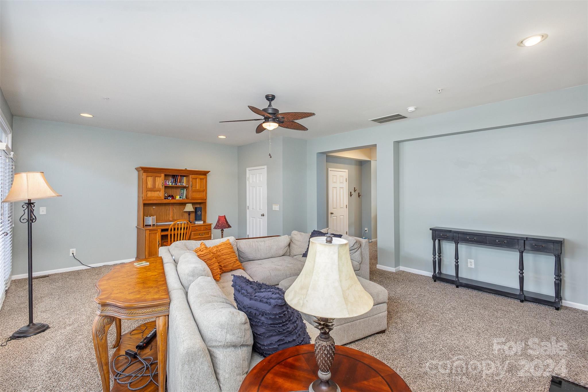 311 Wave Crest Drive Fort Mill, SC 29708 - Photo 6 of 45 a living room with furniture and a table