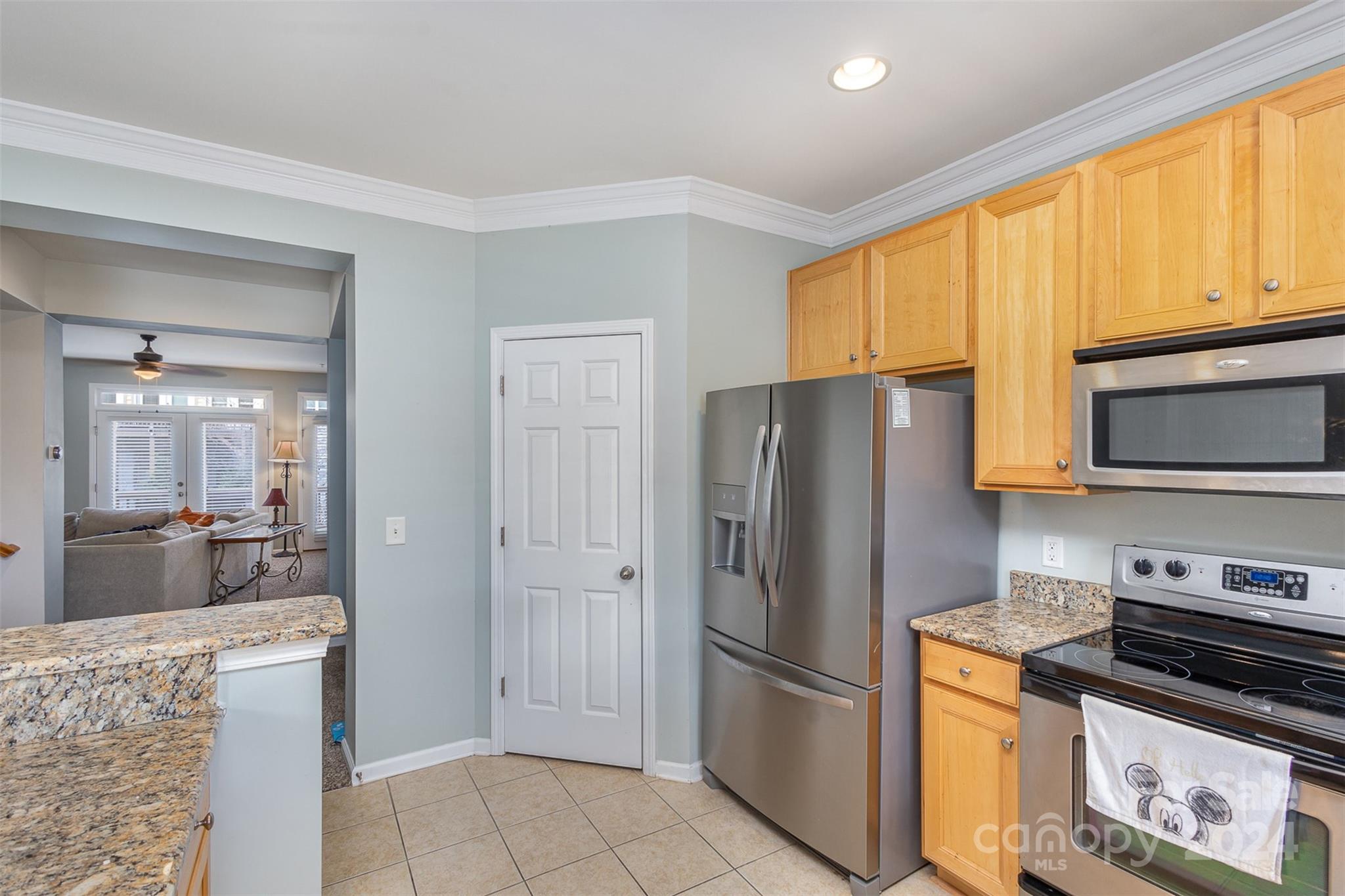311 Wave Crest Drive Fort Mill, SC 29708 - Photo 8 of 45 a kitchen with stainless steel appliances granite countertop a refrigerator stove and sink