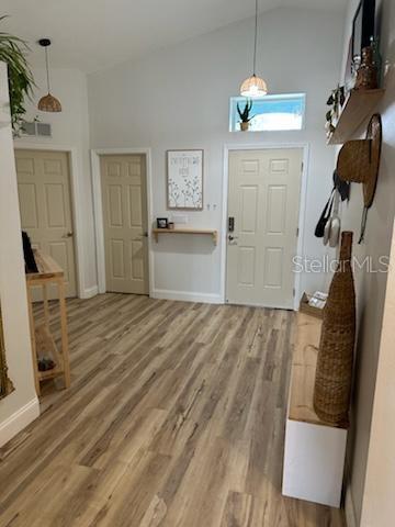 207 Tree Branch Lane Edgewater, FL 32141 - Photo 2 of 22 a bedroom with a bed and a window