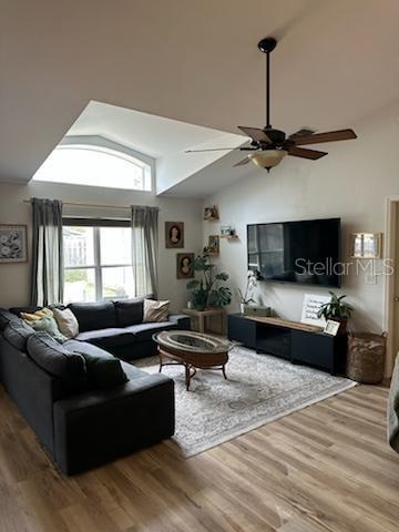 207 Tree Branch Lane Edgewater, FL 32141 - Photo 5 of 22 a living room with furniture and a flat screen tv