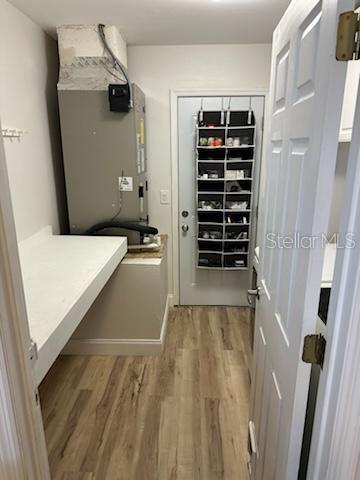 207 Tree Branch Lane Edgewater, FL 32141 - Photo 8 of 22 a view of walk in closet with clothes and shoes