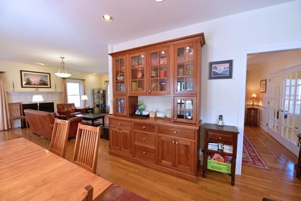102 Argilla Road Andover, MA 01810 - Photo 17 of 30 a large kitchen with stainless steel appliances wooden floor dining table and chair