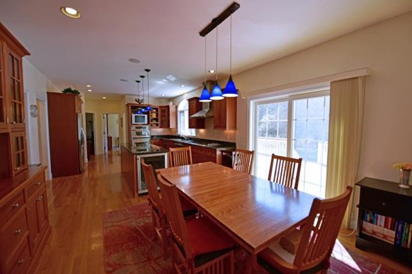 102 Argilla Road Andover, MA 01810 - Photo 18 of 30 a view of a dining room with furniture window and wooden floor