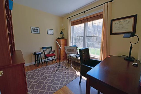 102 Argilla Road Andover, MA 01810 - Photo 10 of 30 a view of a workspace with furniture and a window