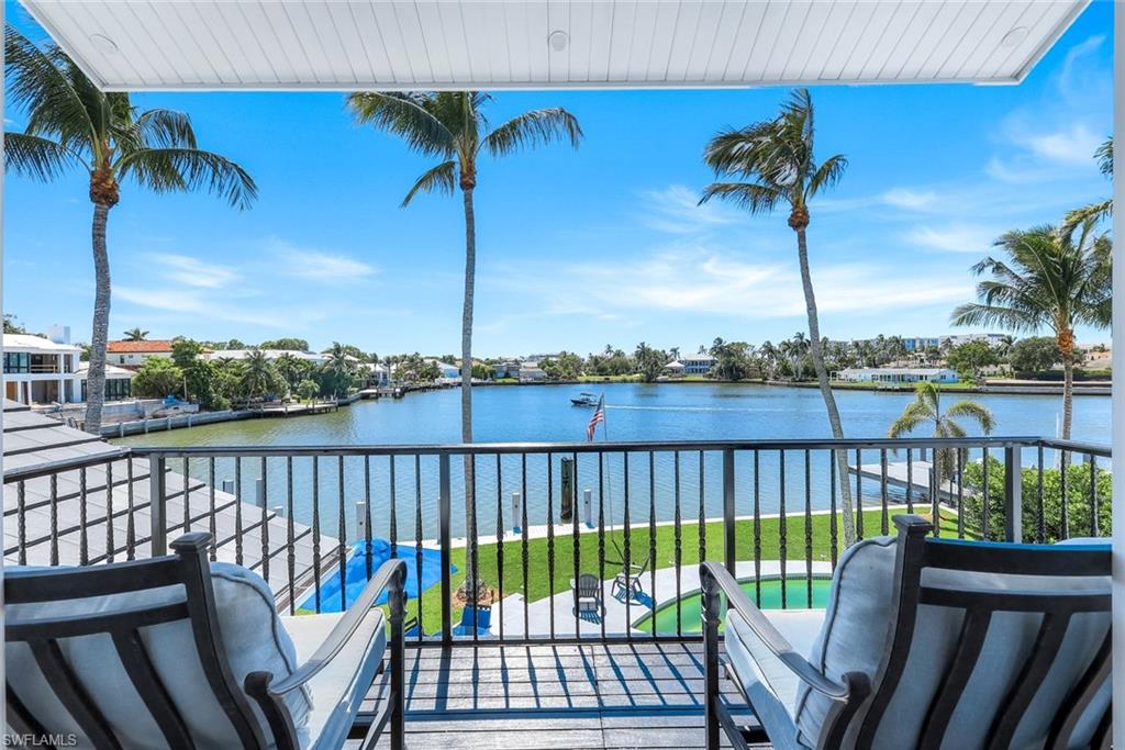 400 Springline Drive Naples, FL 34102 - Photo 34 of 37 Balcony with a water view