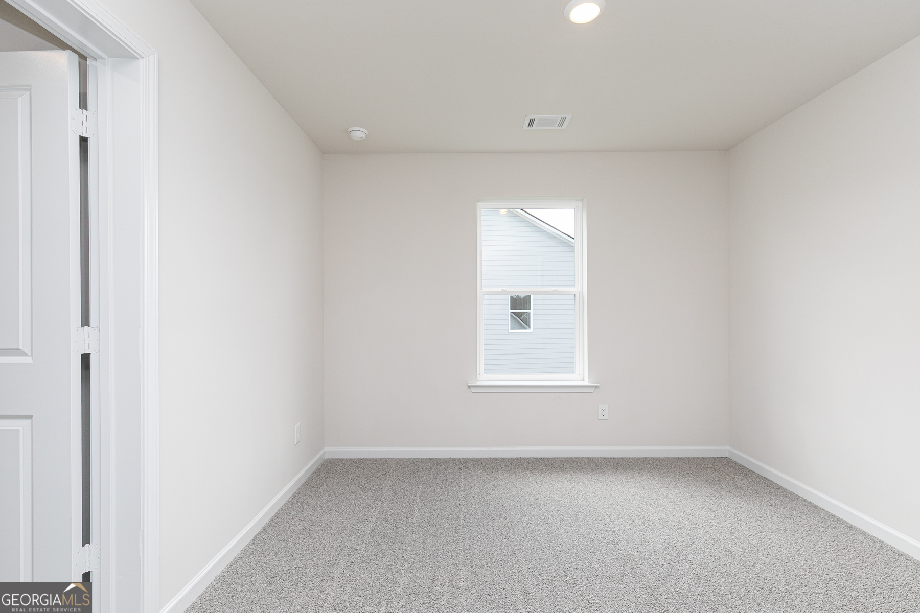 495 Prescott Way Villa Rica, GA 30180 - Photo 12 of 13 a view of a room that has a window in it