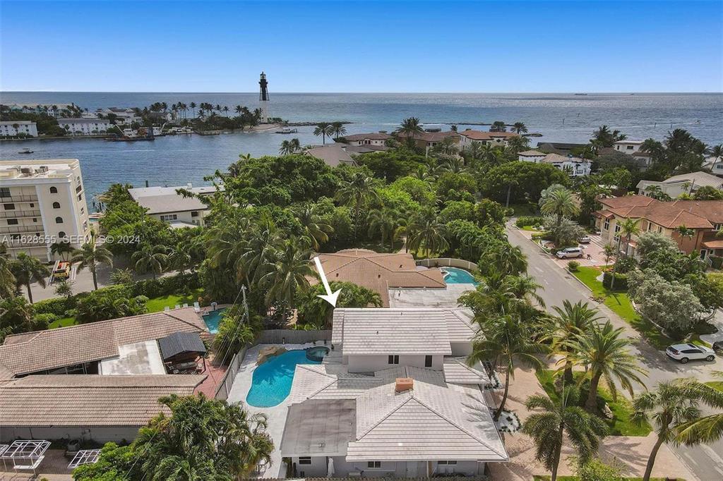 3421 Dover Road Pompano Beach, FL 33062 - Photo 10 of 22 an aerial view of a house with a lake view