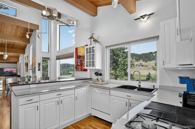 a view of balcony with a small yard