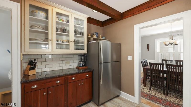 25 Paterson Road Fanwood, NJ 07023 - Photo 12 of 32 a kitchen with stainless steel appliances granite countertop a refrigerator and a sink
