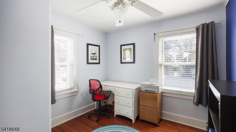 25 Paterson Road Fanwood, NJ 07023 - Photo 14 of 32 a view of a workspace with furniture and a window
