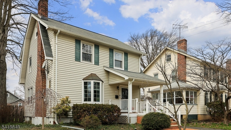 25 Paterson Road Fanwood, NJ 07023 - Photo 15 of 32 a front view of a house with a yard