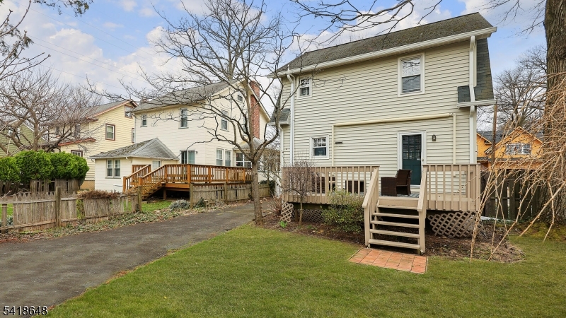 25 Paterson Road Fanwood, NJ 07023 - Photo 25 of 32 a view of a house with a yard and sitting area