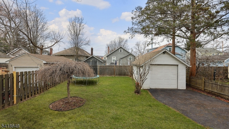 25 Paterson Road Fanwood, NJ 07023 - Photo 27 of 32 a view of a backyard with basketball court