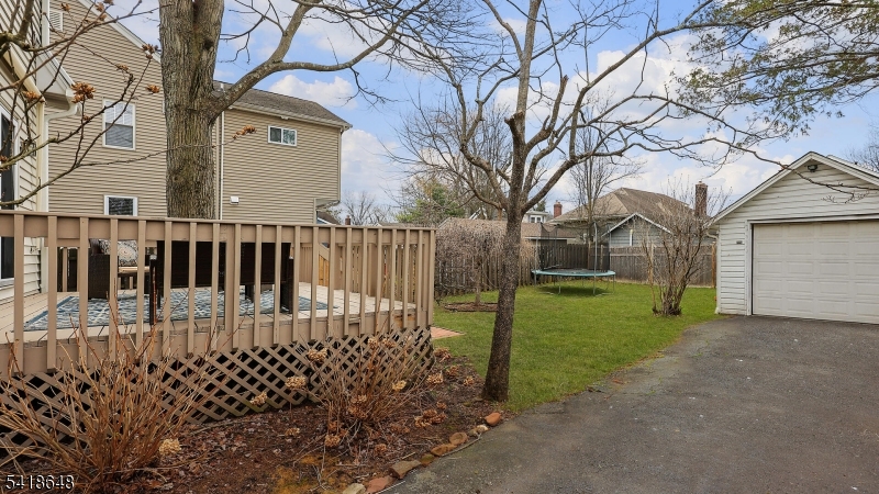 25 Paterson Road Fanwood, NJ 07023 - Photo 28 of 32 a view of a house with a wooden fence