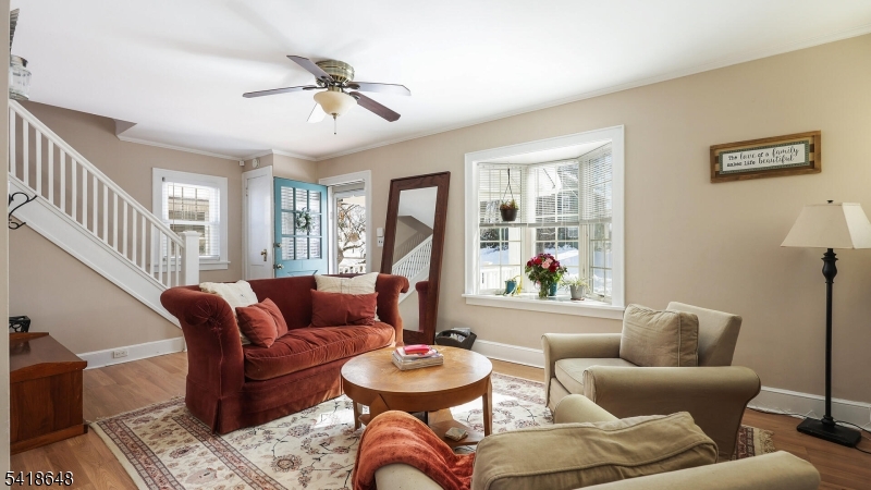 25 Paterson Road Fanwood, NJ 07023 - Photo 6 of 32 a living room with furniture and a large window