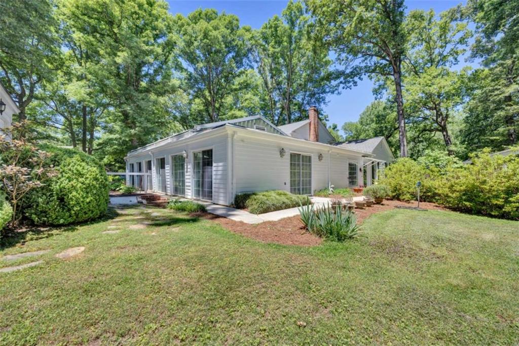 103 Gabriel Way Social Circle, GA 30025 - Photo 55 of 70 a view of a house with backyard and sitting area