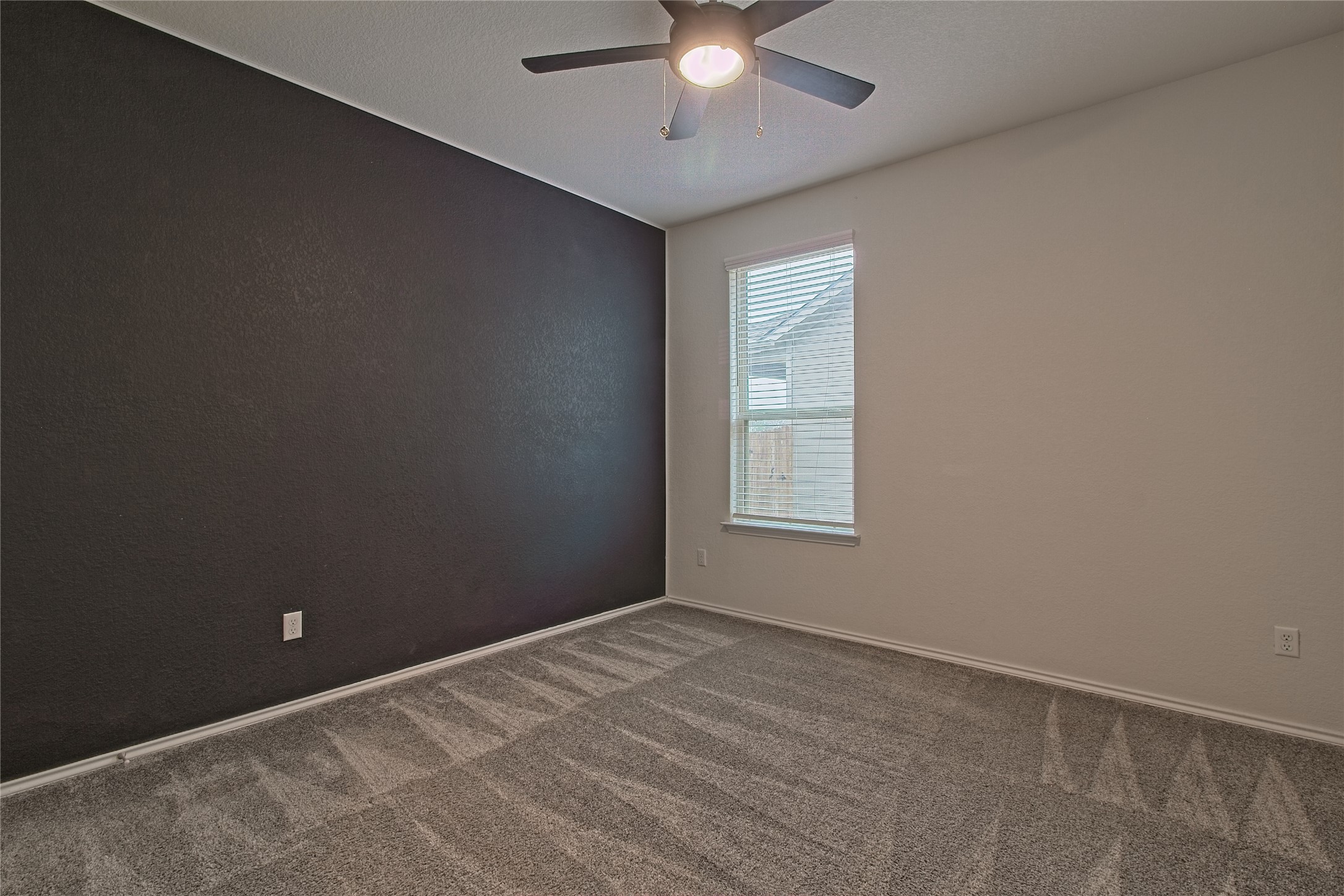 601 Hummingbird Lane Leander, TX 78641 - Photo 21 of 35 Empty room featuring carpet flooring and ceiling fan