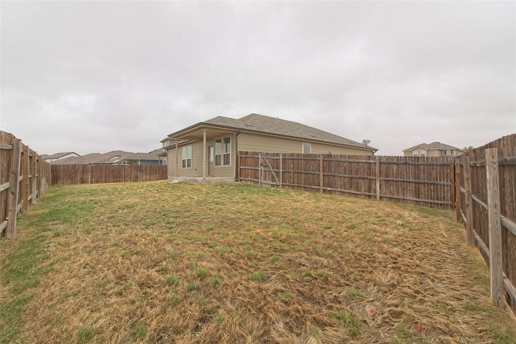 601 Hummingbird Lane Leander, TX 78641 - Photo 28 of 35 Fenced backyard featuring a patio