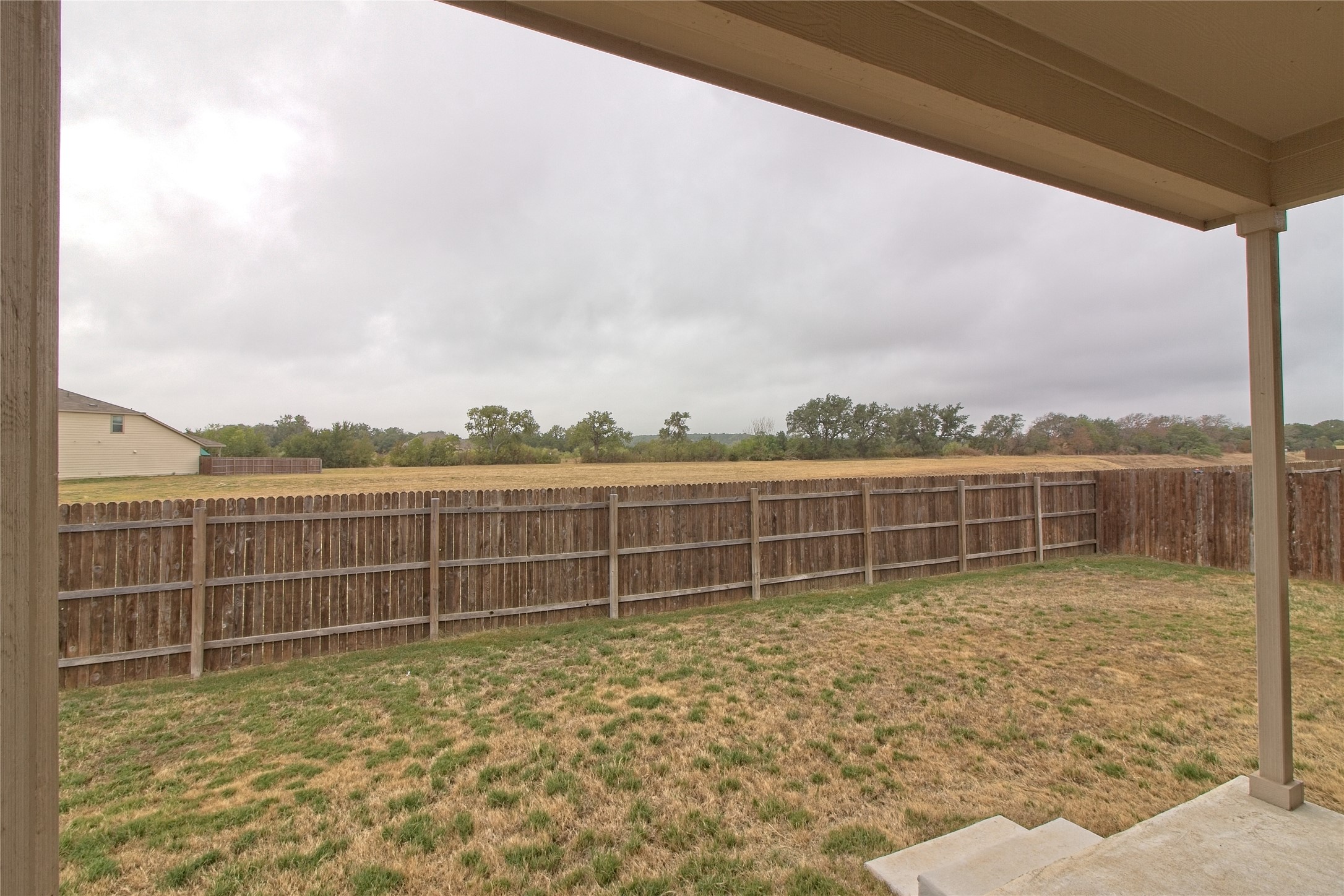 601 Hummingbird Lane Leander, TX 78641 - Photo 29 of 35 Fenced backyard with a patio area