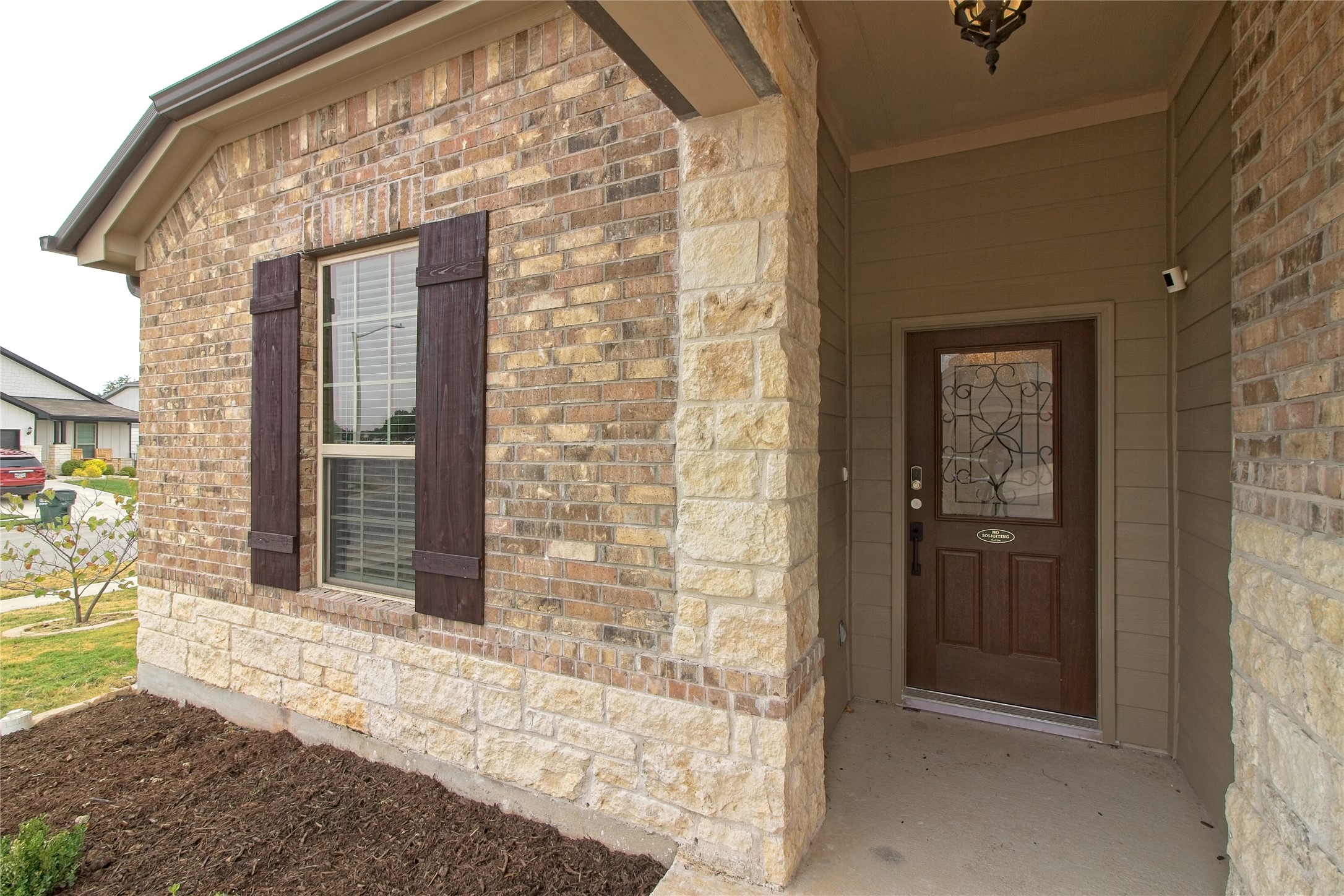 601 Hummingbird Lane Leander, TX 78641 - Photo 4 of 35 Doorway to property with brick siding