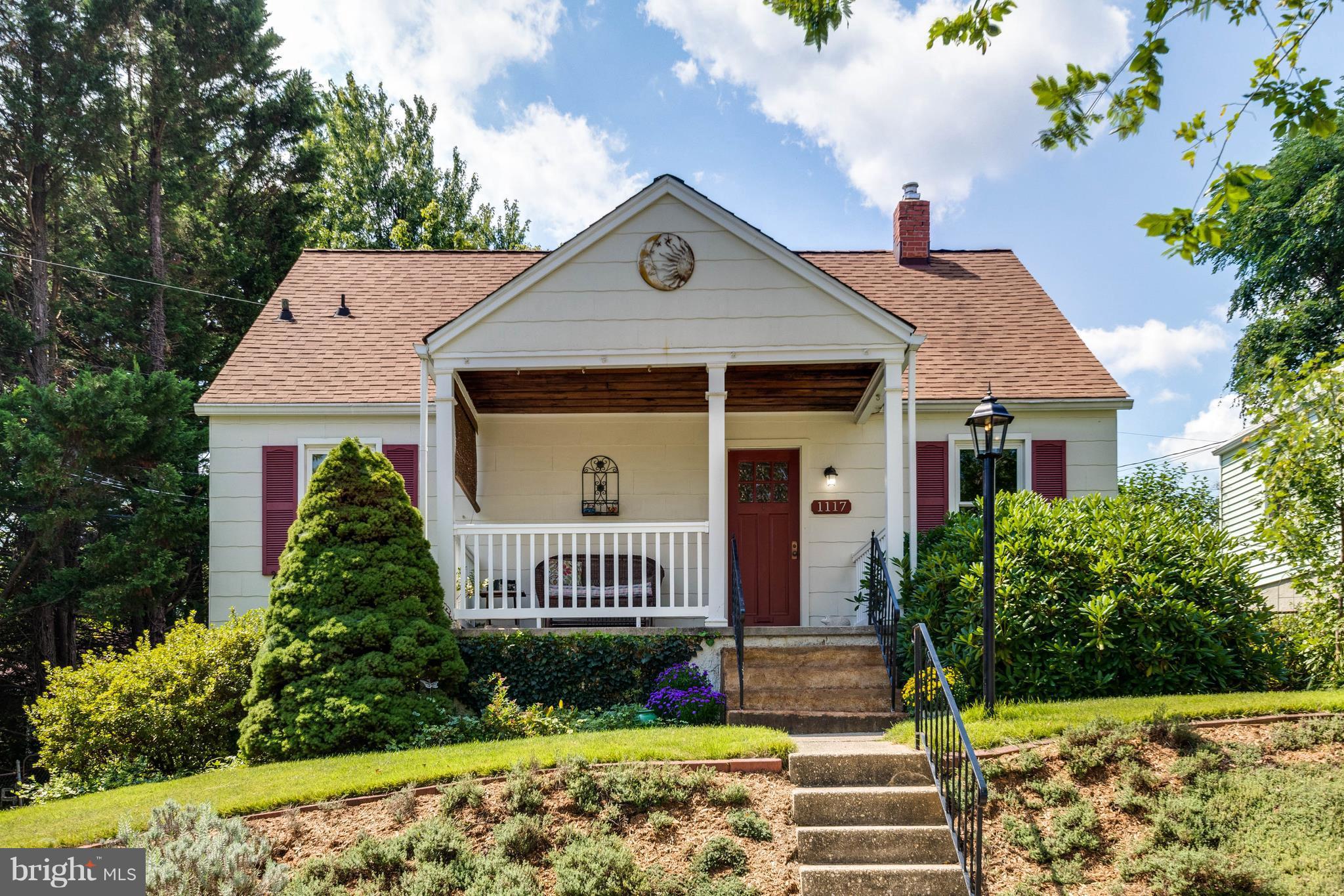 1117 Arran Road Baltimore, MD 21239 - Photo 1 of 25 a front view of a house with garden
