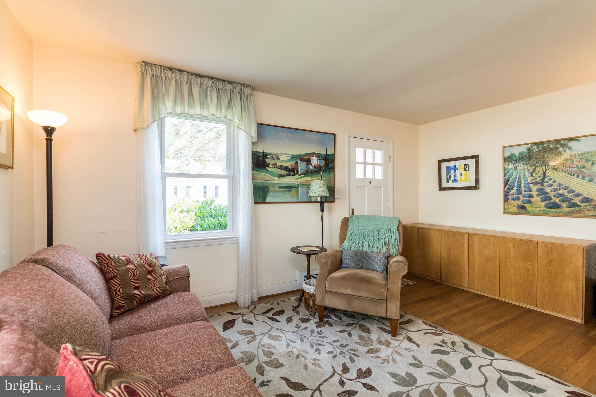 1117 Arran Road Baltimore, MD 21239 - Photo 2 of 25 a living room with furniture and a window
