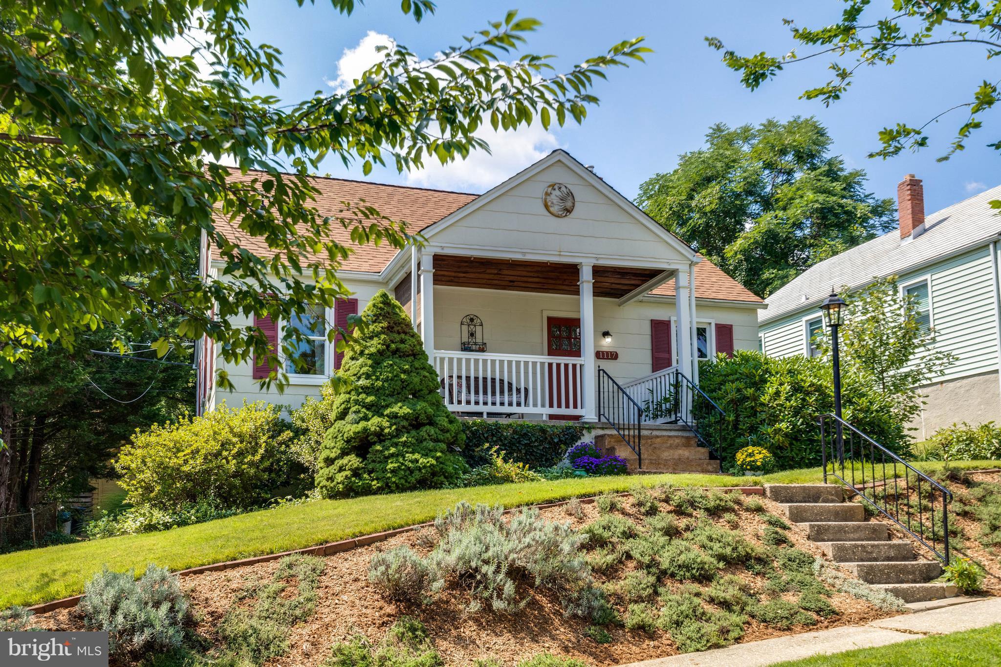 1117 Arran Road Baltimore, MD 21239 - Photo 23 of 25 a front view of a house with a yard