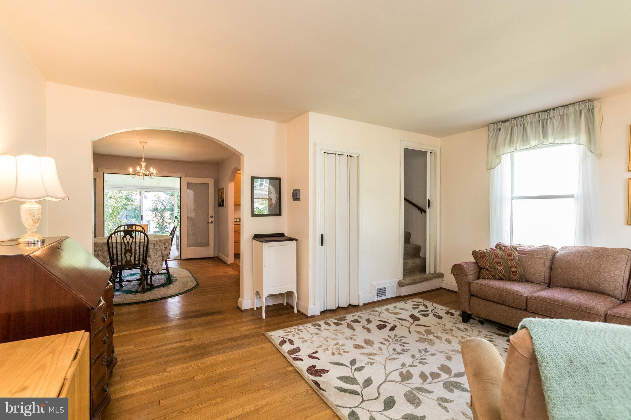 1117 Arran Road Baltimore, MD 21239 - Photo 7 of 25 a living room with furniture and a large window