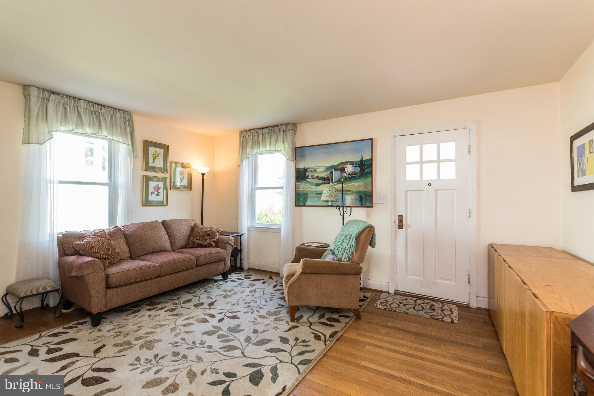 1117 Arran Road Baltimore, MD 21239 - Photo 8 of 25 a living room with furniture and a couch