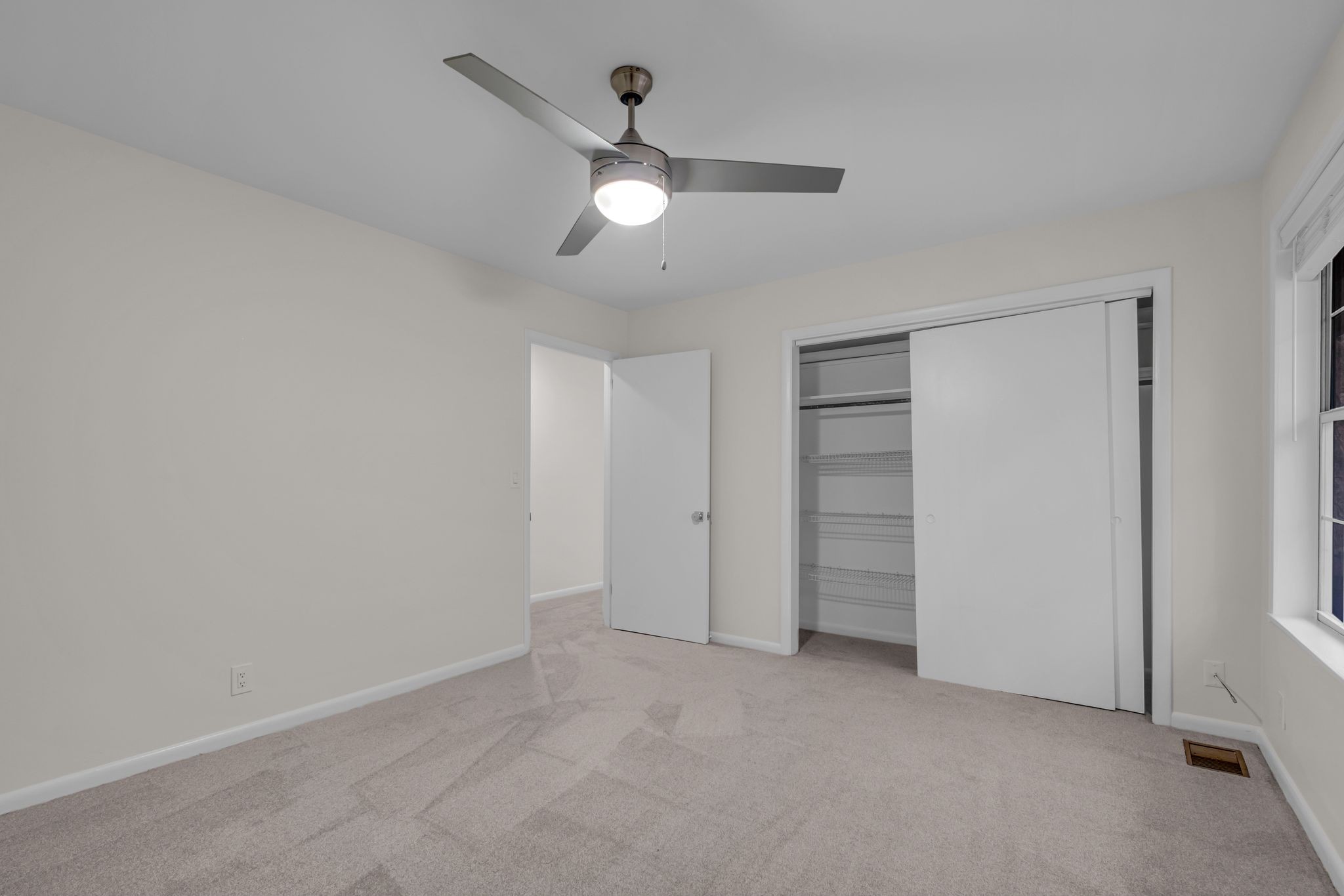 110 Bellevue Road, Unit 29 Nashville, TN 37221 - Photo 14 of 22 an empty room with a empty space and a ceiling fan