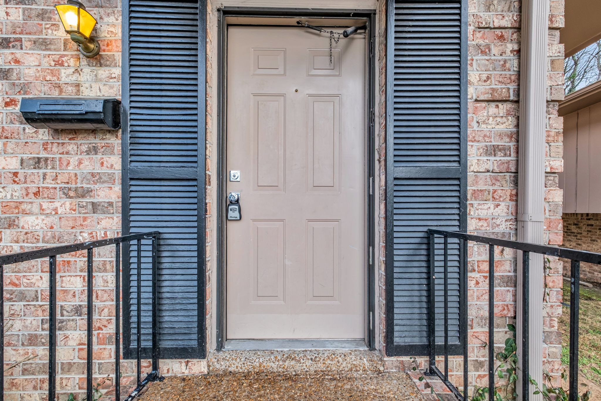 110 Bellevue Road, Unit 29 Nashville, TN 37221 - Photo 3 of 22 a view of a balcony with a door and wooden floor