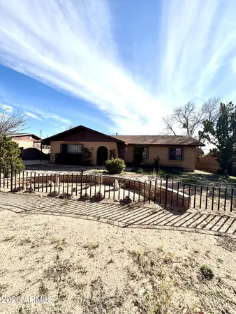 a view of a house with a big yard