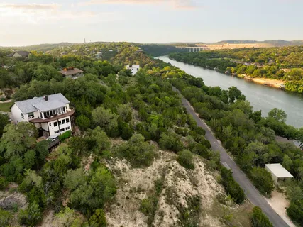 an aerial view of a houses with a outdoor space