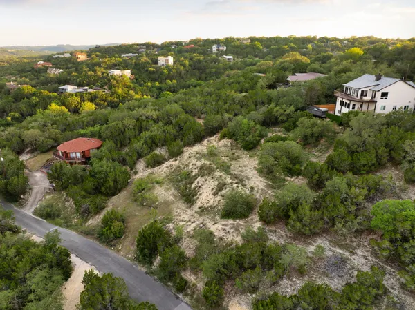 an aerial view of residential house with parking space