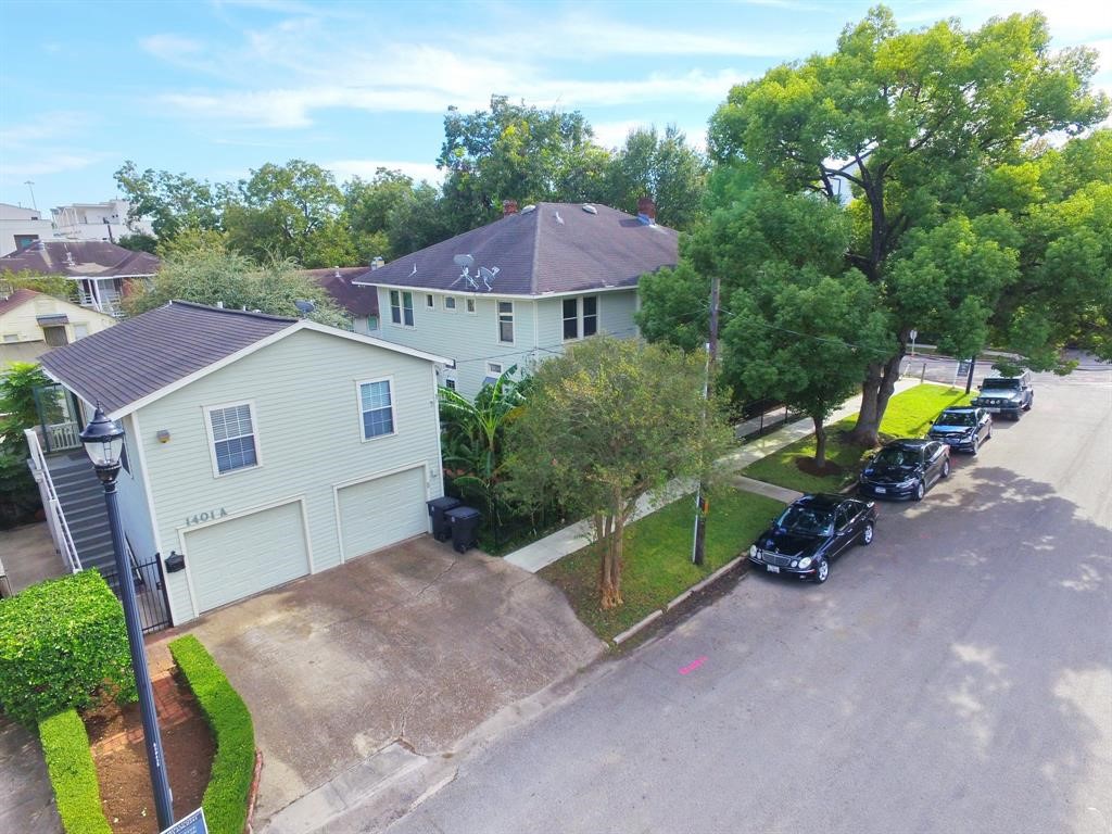 1401 Truxillo Street Houston, TX 77004 - Photo 12 of 20 a view of a house with a backyard and a patio