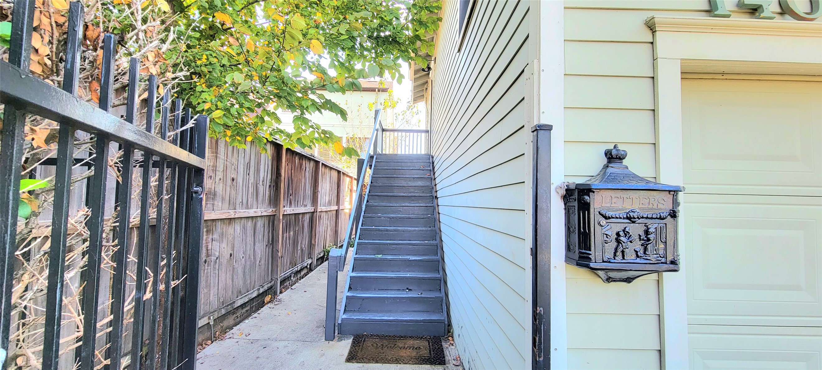 1401 Truxillo Street Houston, TX 77004 - Photo 15 of 20 a view of staircase with wooden floor and a potted plant