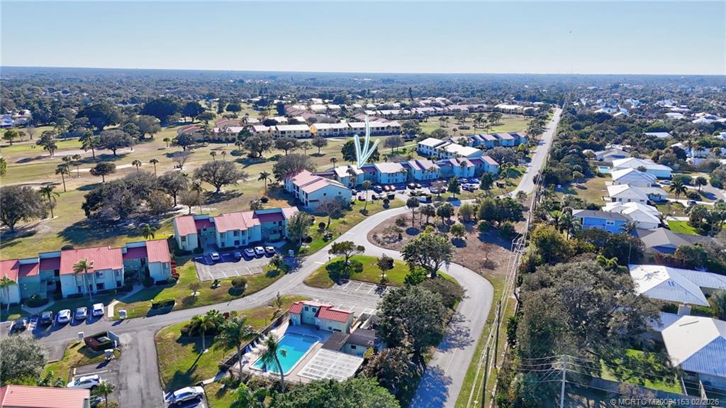 5413 Southeast Miles Grant Road, Unit G206 Stuart, FL 34997 - Photo 47 of 79 an aerial view of a city