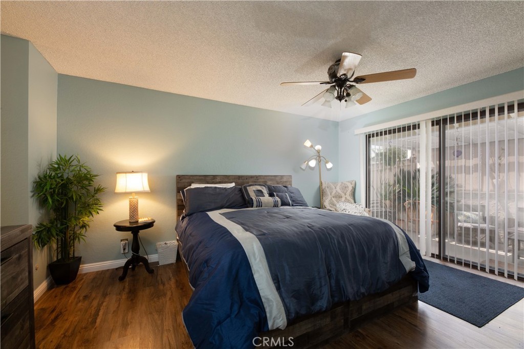 2583 Sandpebble Lane Brea, CA 92821 - Photo 14 of 27 a bedroom with a bed and a mirror