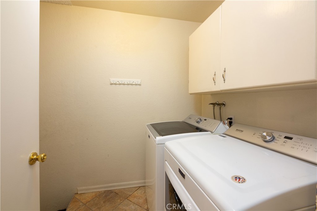 2583 Sandpebble Lane Brea, CA 92821 - Photo 22 of 27 a utility room with dryer and washer