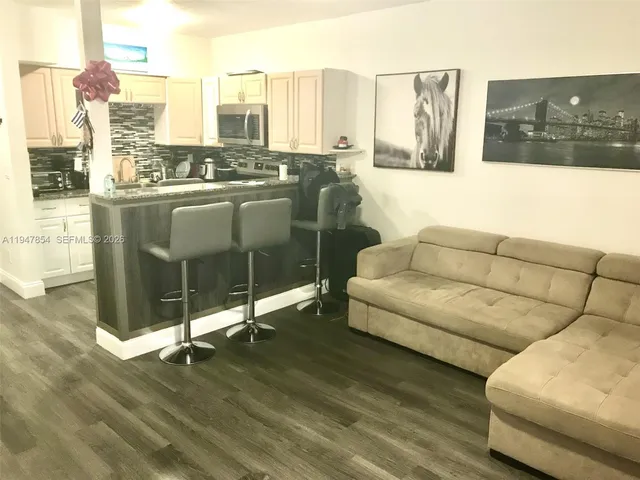 a living room with furniture